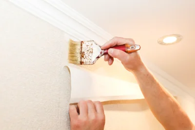 Pose de papier peint à Houlle — revêtements muraux et toiles de verre